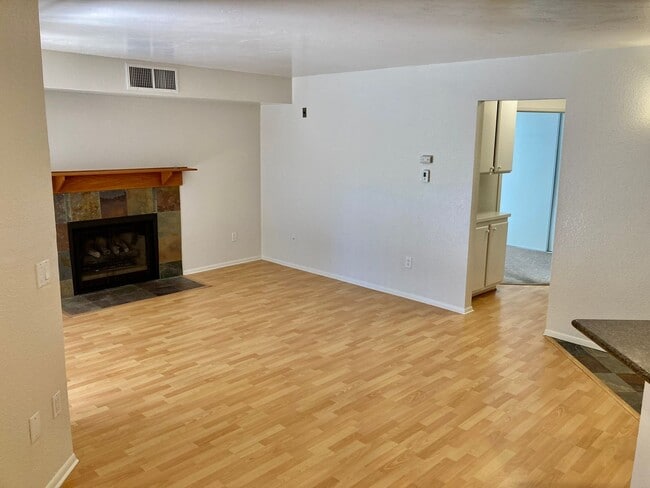 Building Photo - One Bedroom with Garage and IN-Unit laundry in Resort-Style Complex