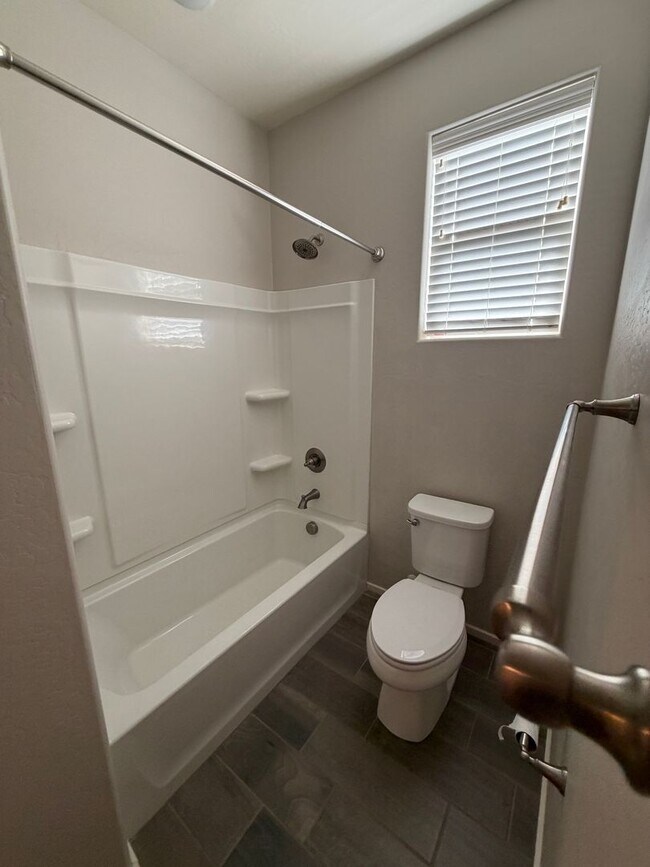 Building Photo - Three Bedroom Two Bath Home with A Den