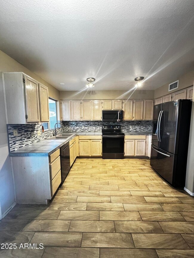 Building Photo - 1836 N Stapley Dr