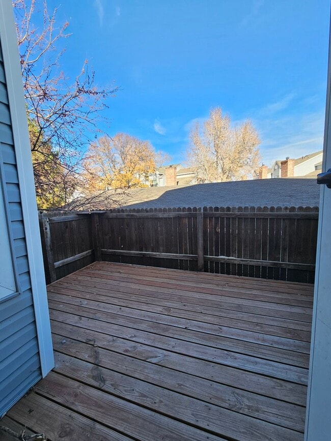 Building Photo - End Unit Condo with Private Patio