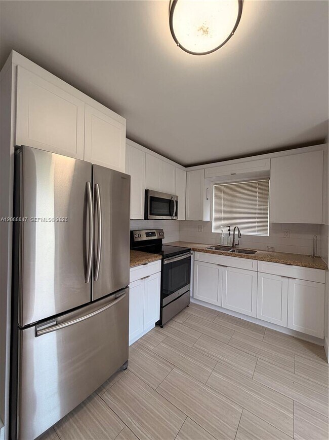 Building Photo - 4400 NW 1st Ave