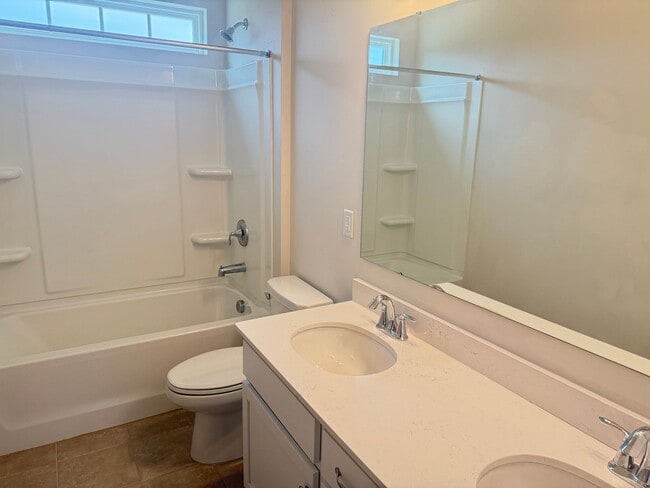 Building Photo - Beautiful Westbranch Home with 2-Car Garage, Covered Porch & Greenway Entrance Across the Street