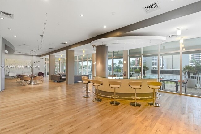 Building Photo - 10275 Collins Ave