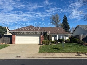 Building Photo - Action Properties RES Inc: offering Single Story, New Paint, Great Room with formal dining area, ...
