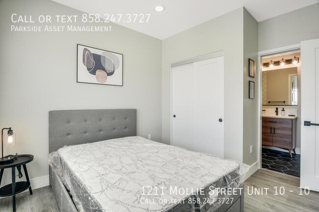 Building Photo - $1,000 Move-in Credit! The Carl on Lauretta