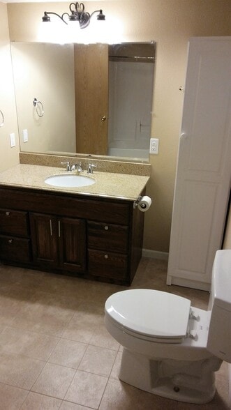 bedroom #2 bathroom with granite countertops and duri ceramic floors - 114 Walnut Street