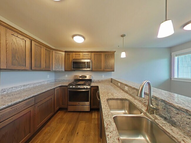 Building Photo - Stunning 3-bedroom, 2.5-bathroom condo with attached 2 stall garage!