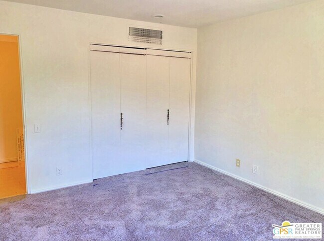 Building Photo - 1655 E Palm Canyon Dr