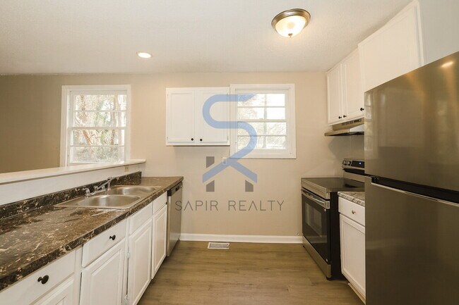 Building Photo - Move in before November 30th and choose your reward: a $250 Amazon Gift Card or a 55 Smart TV!