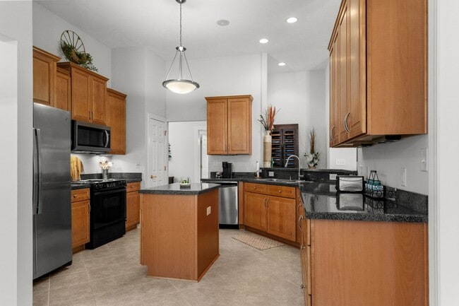 Building Photo - Live the Coastal Lifestyle in This Cypress Keys Beauty!