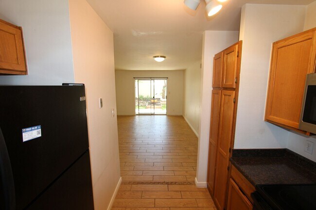 Building Photo - Ground-Level 2 Bedroom Condo in Pineview Village | Covered Parking + Storage