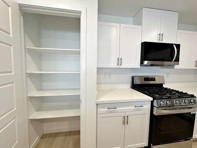 Building Photo - 1 WEEK FREE RENT! BRAND NEW BUILD! 2 BEDROOM TOWNHOME!