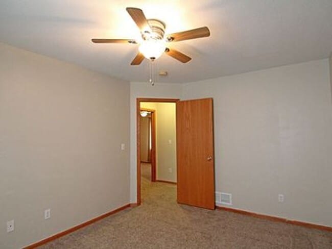 Building Photo - Great NE location -  4 bedroom 2.5 bath with attached 2 stall garage. Close to shopping & restaur...