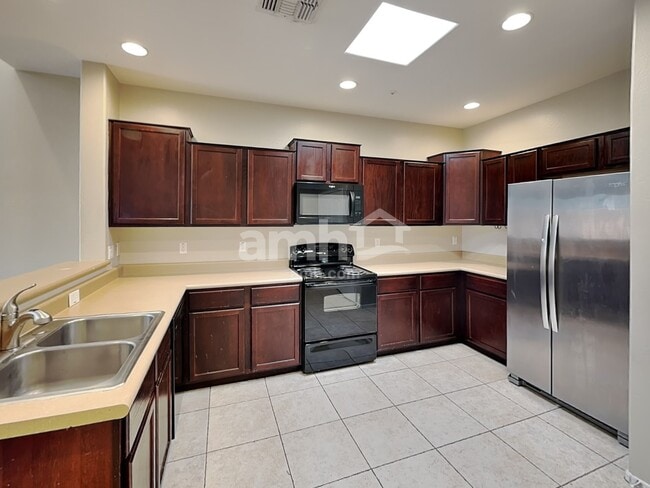 Building Photo - 8940 W Olive Ave