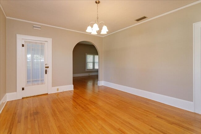 Building Photo - Run don't walk for this one of a kind beautifully maintained Old Florida Charmer on a park like d...