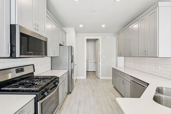 Building Photo - Discover Elevated Living at Normandy Village