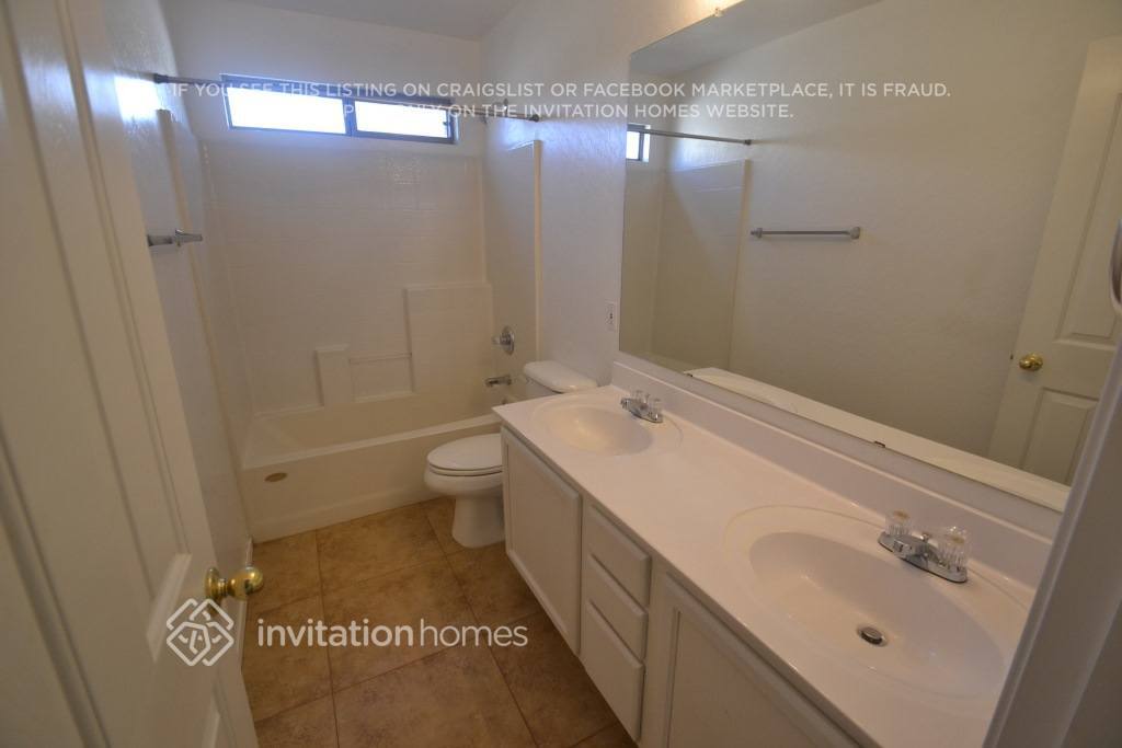 Building Photo - 7447 W Trails Dr