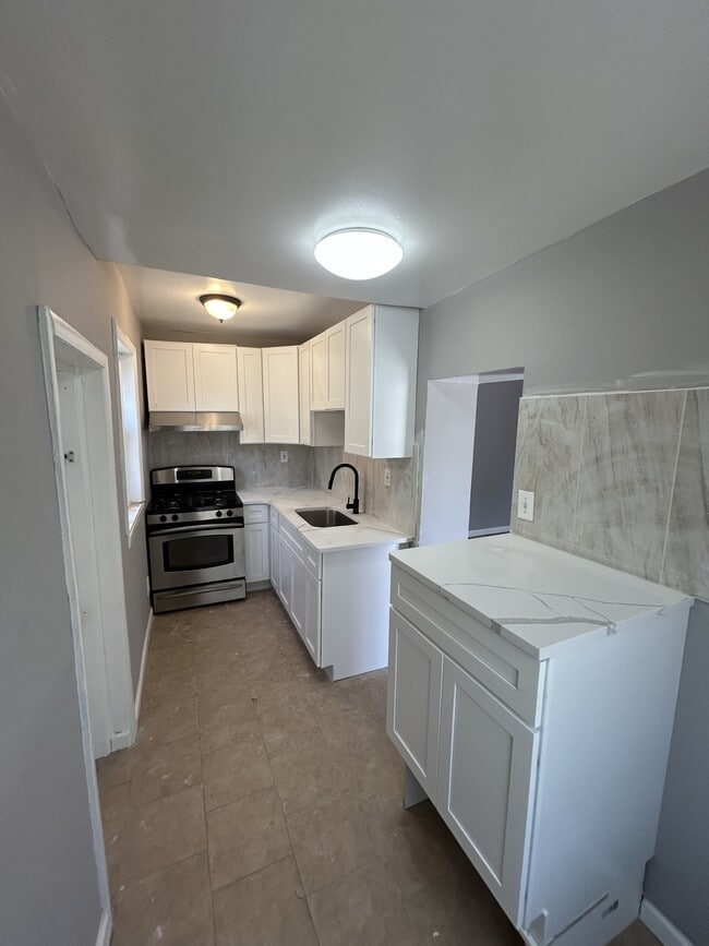 Building Photo - 6165 Delancey St