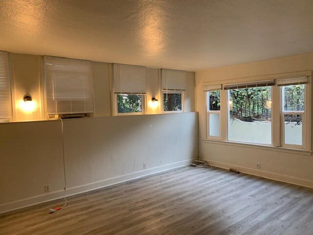 Living room looking towards front window. - 24606 University Ave
