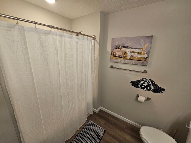 Building Photo - Vroooom . . . . the ROAD is calling. . . .Fully furnished themed rental includes all utilities an...