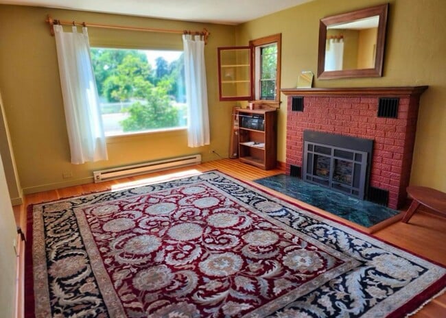 Building Photo - Renovated In-Town Home with Creek & Garage