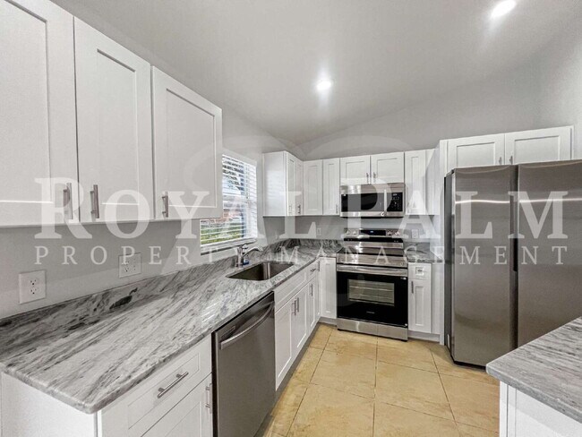 Building Photo - Stop and Smell the Roses – Updated 3BR/2BA Single Family Home with a Yard That’s Ready to Bloom