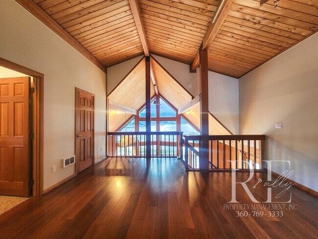 Building Photo - Waterfront Living in Indianola – Dock, Bea...