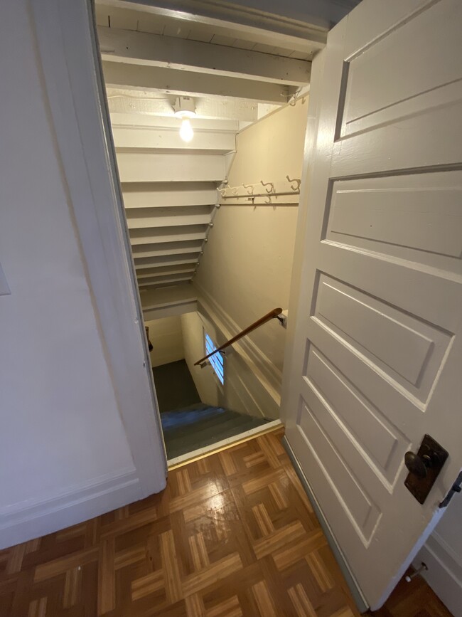 Basement access with designated storage space. - 16 3rd St