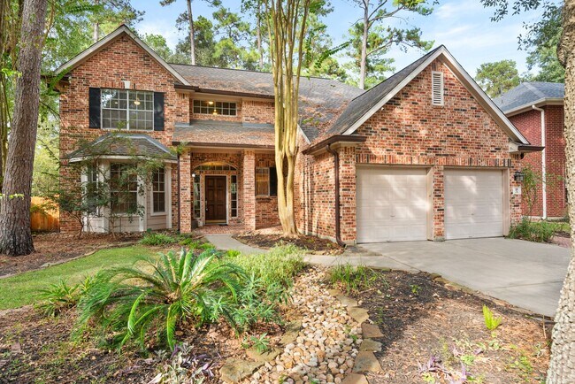 Building Photo - The Perfect Woodlands Retreat: Steps from ...