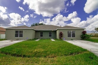 Building Photo - 4/3 Duplex Home in Poinciana Available, April 2026