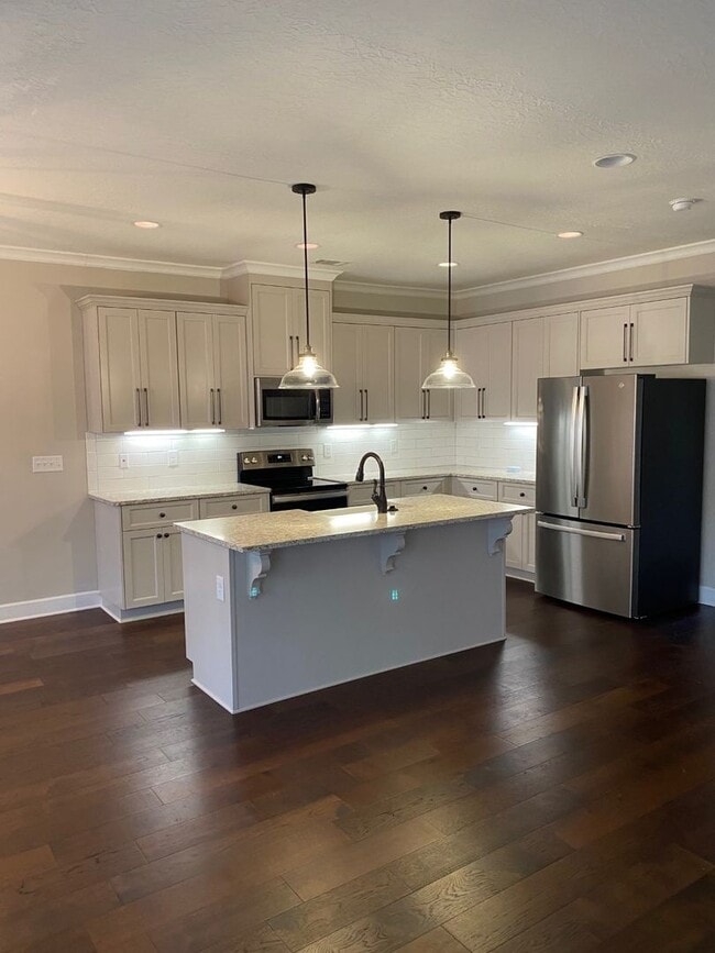 Building Photo - AVAILABLE NOW IN AVENEL PLACE