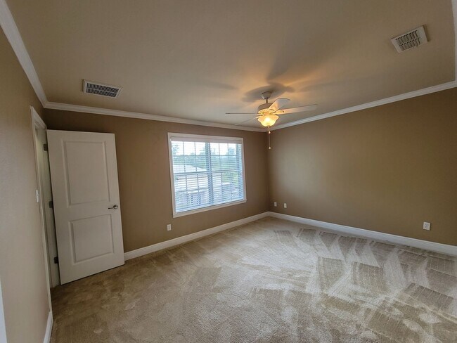 Building Photo - 3 Bedroom town home for rent August 6, 2026 in gated community with pool, renting for $1550 per m...