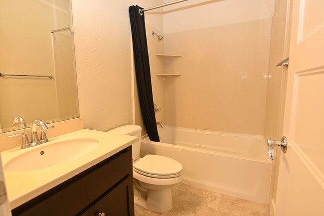 Building Photo - Tralee Village-Tri-Level Townhome, Modern ...