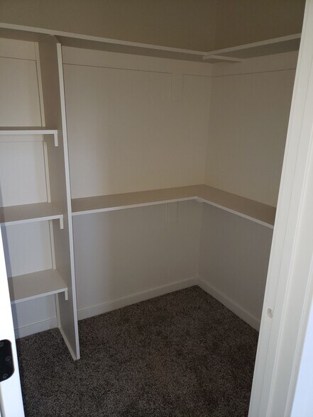 Built in shelving in master bedroom closets - 1121 Sundial Ln