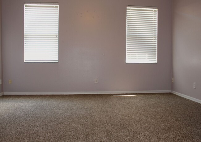 Building Photo - Freshly painted, four bedroom home available now!