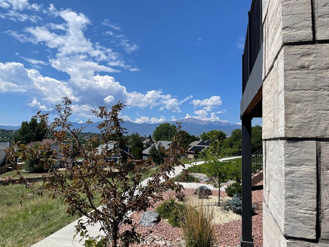Building Photo - Impressive 4 Bedroom Townhome Nestled in M...