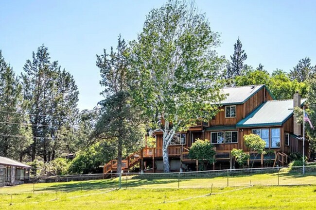 Building Photo - Custom Rustic 4-Bdr on beautiful 5 acres with Greenhouse in Sisters!