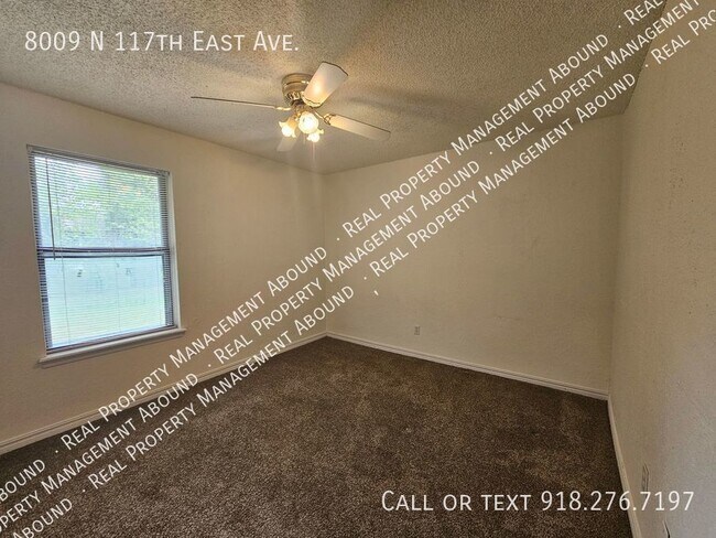 Building Photo - 8009 N 117th E Ave