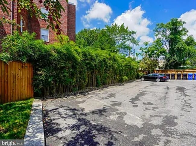 Assigned parking spot in gated parking lot - 1384 Bryant St NE