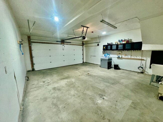 Building Photo - Check out the private fenced backyard!