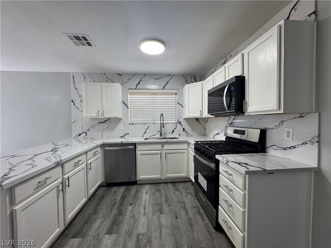 Building Photo - 10171 Arlington Abby St