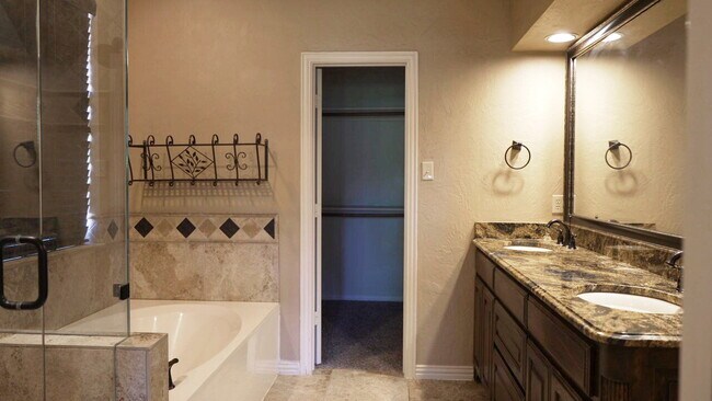Building Photo - "Beautiful 4-Bedroom Home with Elegant Fin...