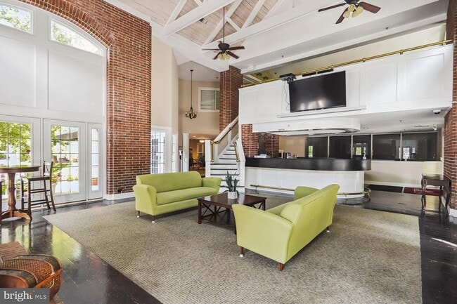 Building Photo - Stylish Two-Level Condo in Gables of Tuckerman Near Pike & Rose!