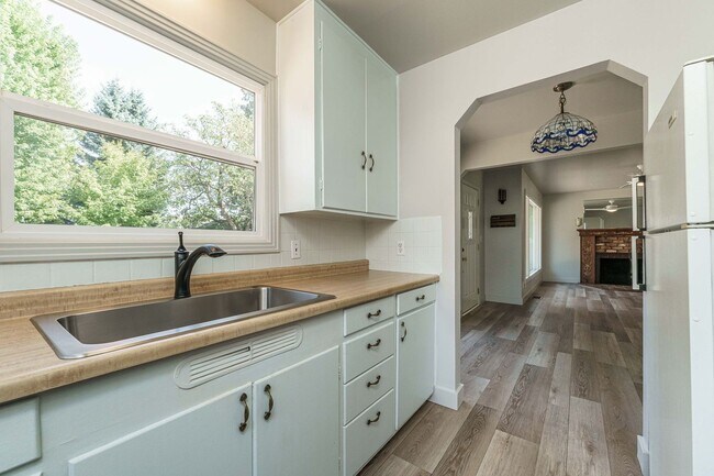 Building Photo - MOVE IN SPECIAL - Charming 1950’s Two-Bedroom with Character & Shared Outdoor Space