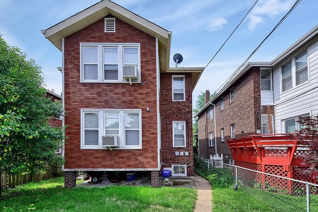 Building Photo - 4955 Tholozan Ave