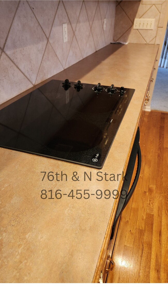 Smooth, flat stove top provides a clean look, enhancing the aesthetic appeal. - 6003 N Norton Ave
