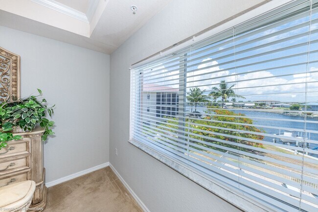 Building Photo - FURNISHED WATERFRONT CONDO IN PUNTA GORDA ISLES
