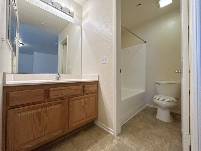 Building Photo - Two-Story 3-Bedroom Condo in Orange Gardens HOA!
