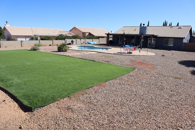 Building Photo - Home With A Pool and Much More!