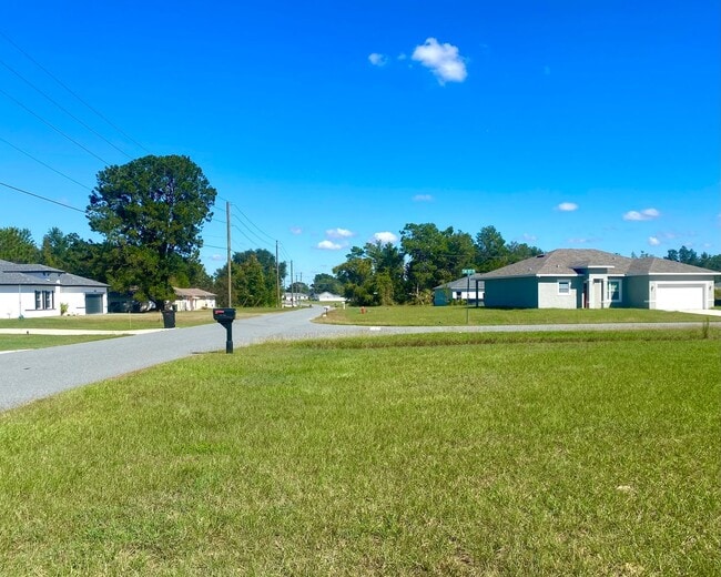 Building Photo - Maintenance-Free 4 Bedroom Rental!